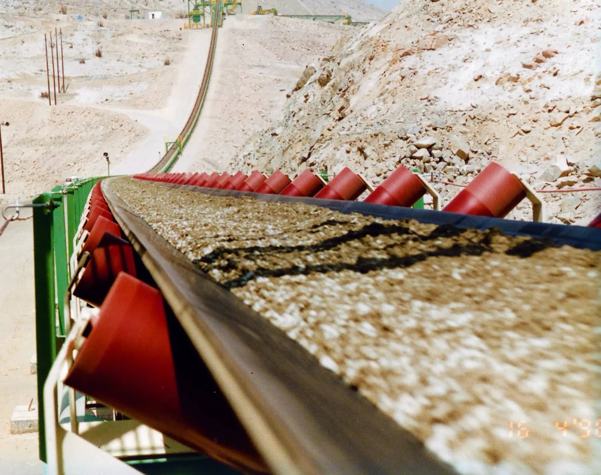 Conveyor with material, running in South America