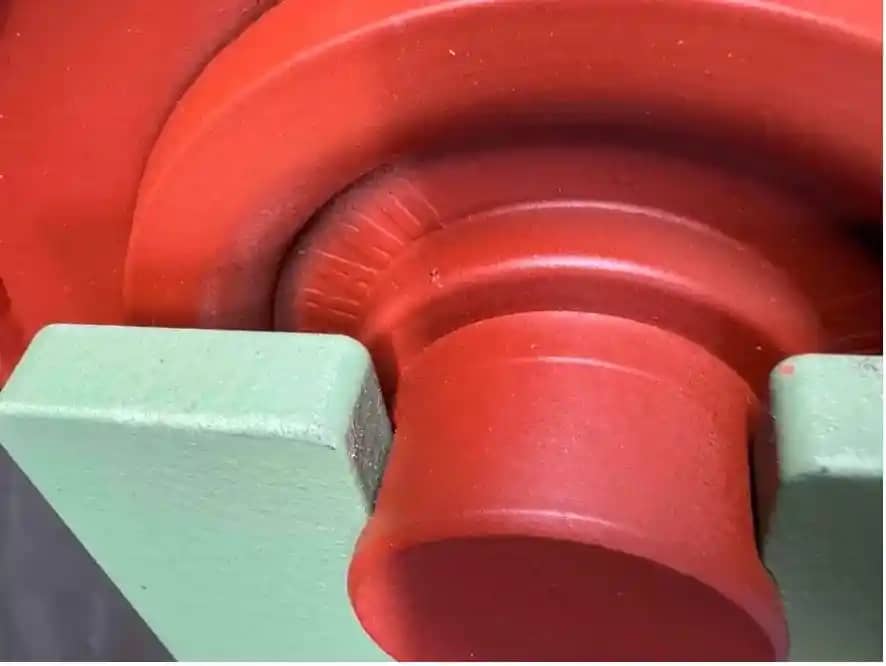 Close-up of Simondou roller shaft fit check in frame