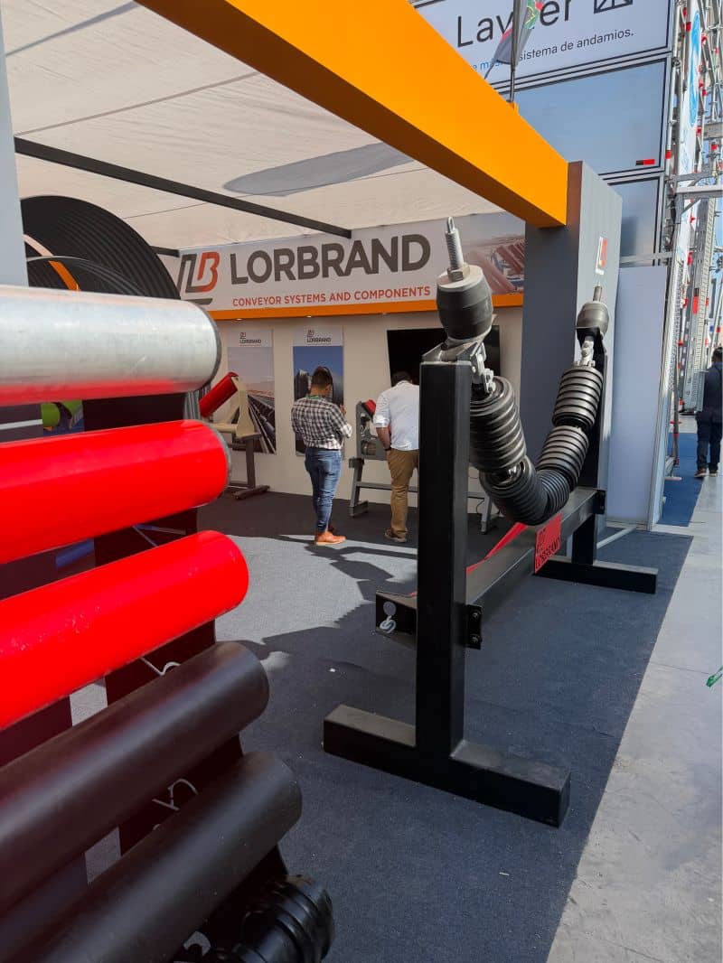 Rollers and a garland impact idler at the front of the Lorbrand stand, EXPONOR 2026