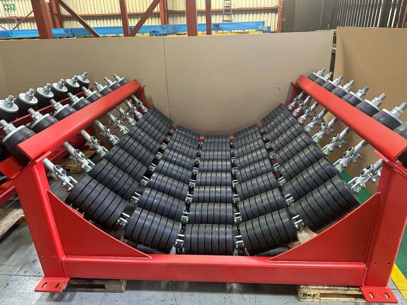 Five-roll garlands of rubber-ring impact rollers across a garland impact bed